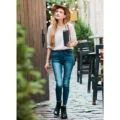 Young Attractive Woman In Casual Style Clothes Walking Along The